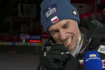 Żyła przygryza złoty medal (fot. screen/YouTube)
